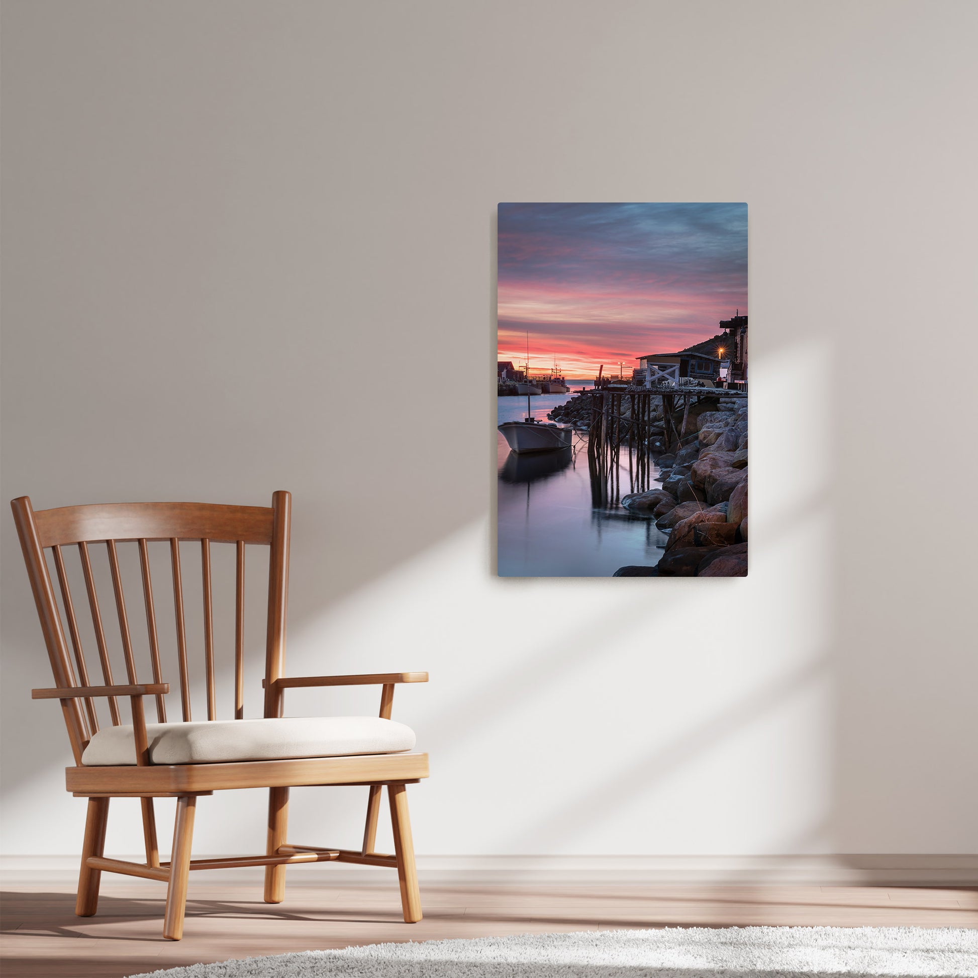 Ray Mackey's Petty Harbour Sunrise photography reproduced on HD metal print and displayed on wall