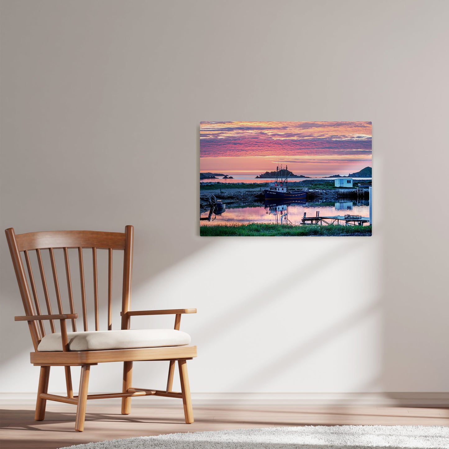 Ray Mackey's Ferryland Sunrise photography reproduced on HD metal print and displayed on wall